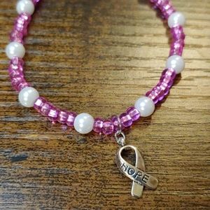 Handmade beaded bracelet w/cancer awareness charm